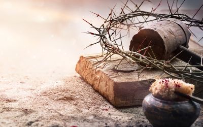 Graphic of a crown of thorns and hammer to illustrate the article highlighting the love of Jesus Christ, titled 